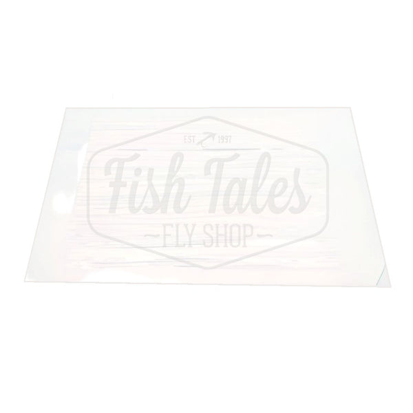 A sheet of 210Fab Chironicuts fly tying body material in opal on a white background.