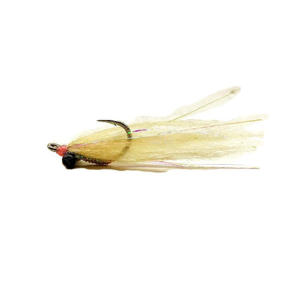 A Polar Fiber Gotcha saltwater flats fly with a tan body and wing, pink accents, and dark eyes on a white background.