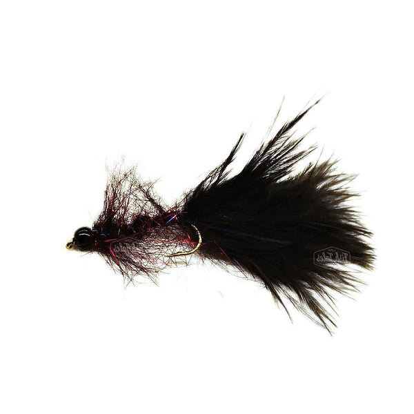 A black Voodoo dubbing leech fly tied with midnight voodoo dubbing, a marabou tail and a bead head on a white background.