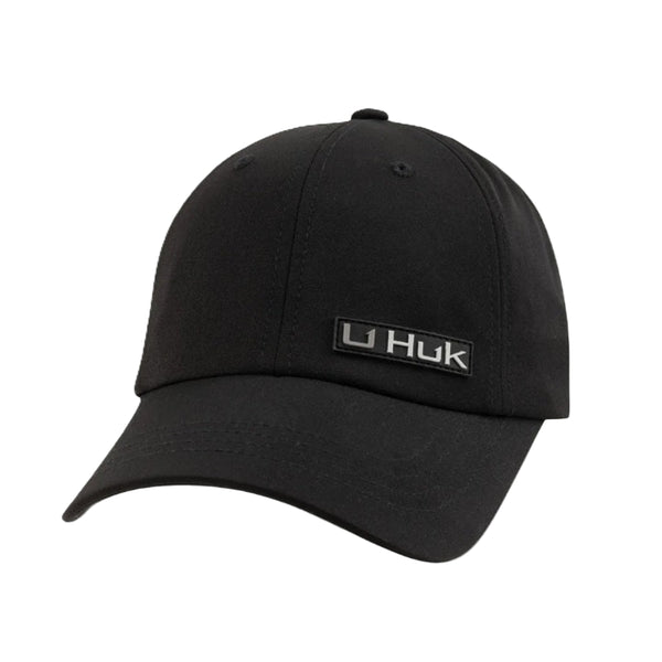 Black Huk Women's Pony Tail Hat with logo on a white background.