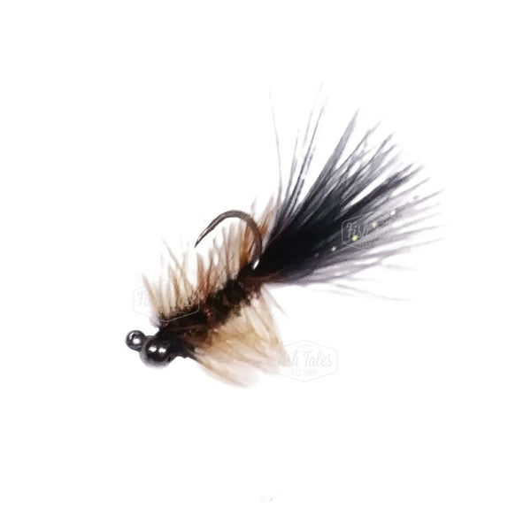 A Vampire Bugger Jig Leech streamer tied in brown and black on a jig hook, over a white background.