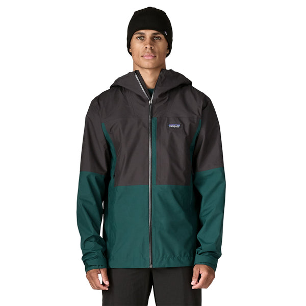 Man wearing a Patagonia Men's Boulder Fork Rain Jacket in Cascade Green with grey/black accents on a white background.