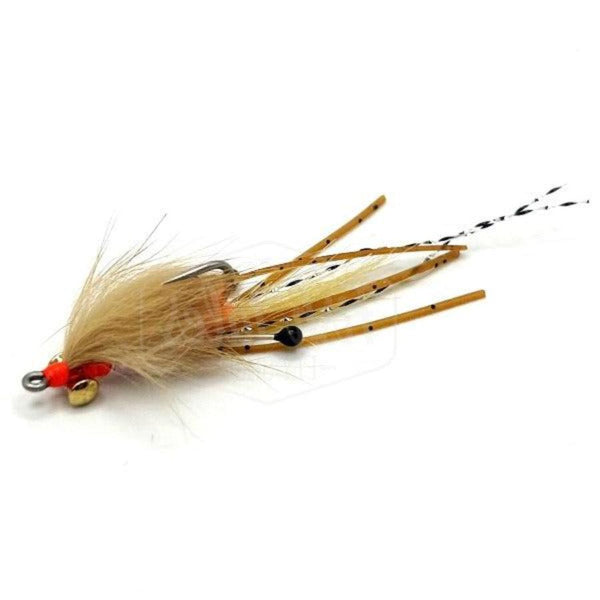 A tan-colored Peterson Spawning Shrimp Fly with barbell eyes, mono stalk eyes, orange spawning hot spots, and black flake tan sili legs, presented against a white background.