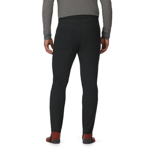 Person wearing the black Simms Men's Strata 330 Fleece Bottoms on a white background.
