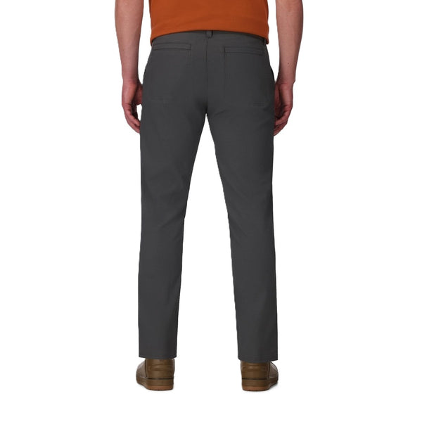 Person wearing the Simms Men's Wanaka Quick Dry Pant in Slate details on a white background.