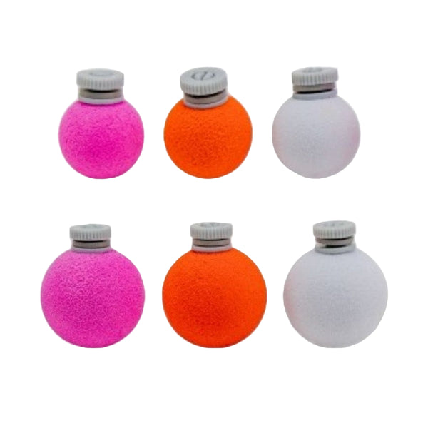 A group of pink, orange, and white Airlock Strike Indicators showing size contrasts on a white background.
