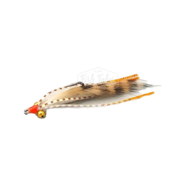 A barred tan Cayo Coco Loco saltwater flats fly with orange thread head, barred legs with orange tips and gold bead chain eyes on a white background.