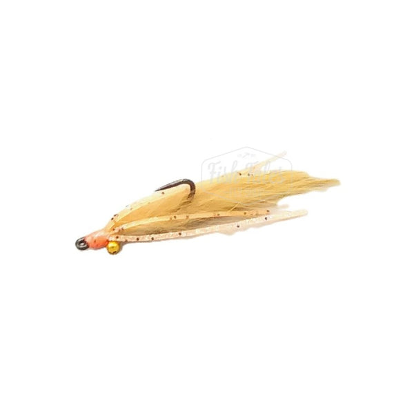 A tan Cayo Coco Loco saltwater flats fly with pink accents and gold bead chain eyes on a white background.
