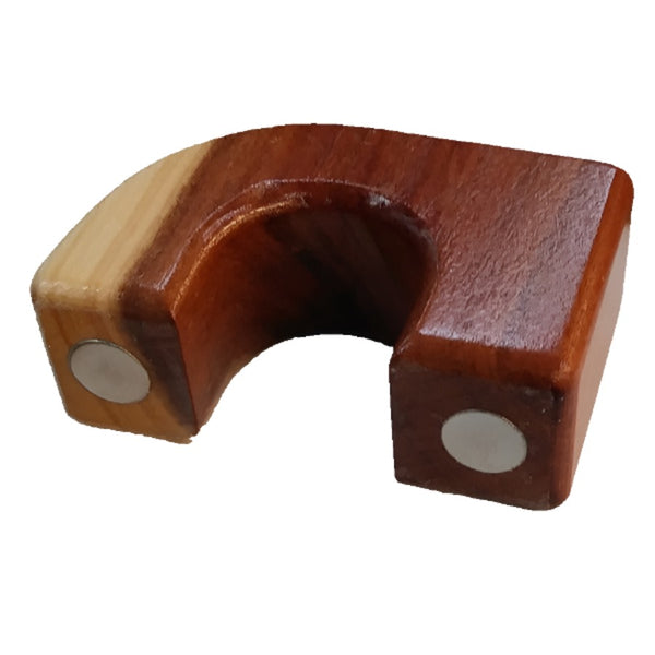 close up of one docs exotic wood magnetic rod holder on white background