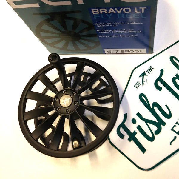 spare spool for black echo bravo fly fishing reel on white background 