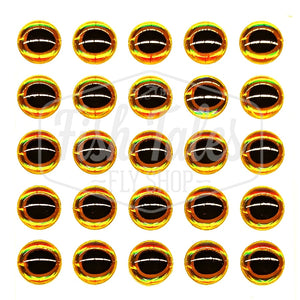 Set of gold and black 3D Oval Pupil Stick On Eyes for fly tying on a white background.