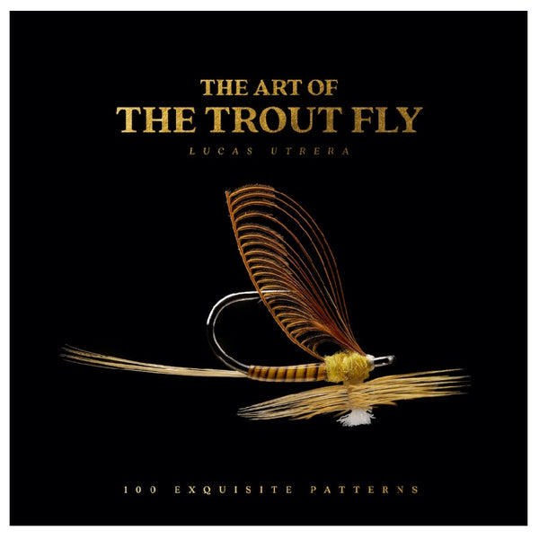 Book cover for 'The Art of the Trout Fly' by Lucas Utrera, featuring a detailed golden-brown fly on a solid black background with gold text.