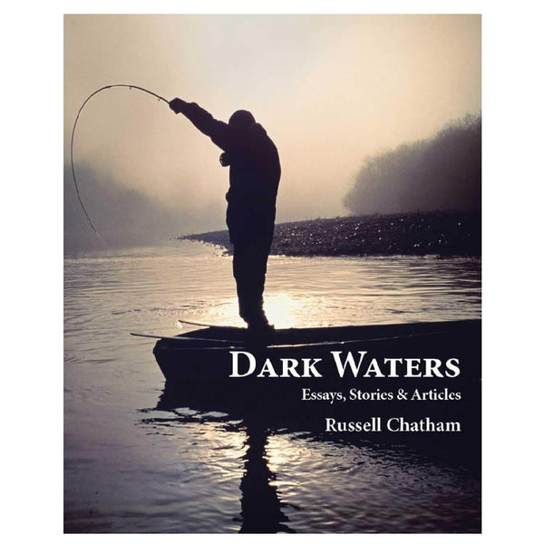 Book cover for 'Dark Waters: Essays, Stories & Articles' by Russell Chatham, featuring a silhouetted angler casting a line from a small boat on calm water at sunrise or sunset.