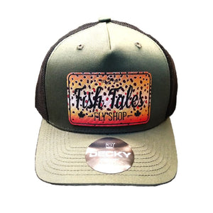 Olive and black trucker hat with brown trout 'Fish Tales Fly Shop' logo patch, on a white background.