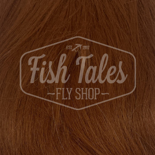 close up view of fish tales craft fur for fly tying rust