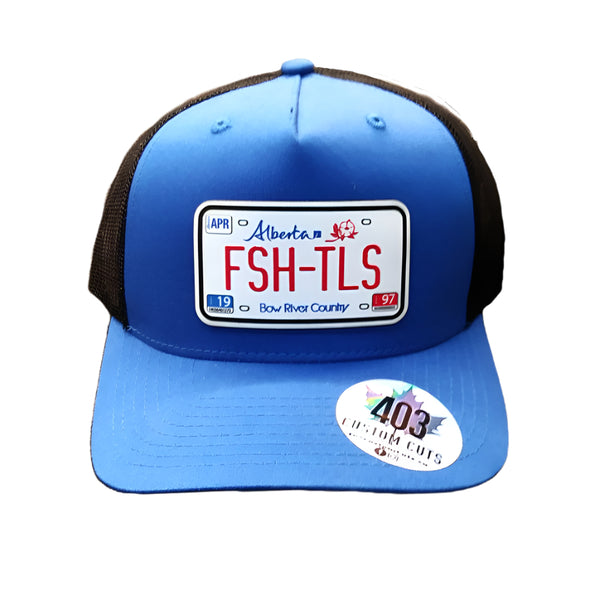 Blue and black trucker cap with a Fish Tales Alberta license plate design on a white background.