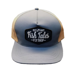 Gray and beige full cloth baseball cap with 'Fish Tales Fly Shop' logo, shown on a white background.