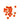 Several fluorescent orange slotted fly tying beads on a white background.