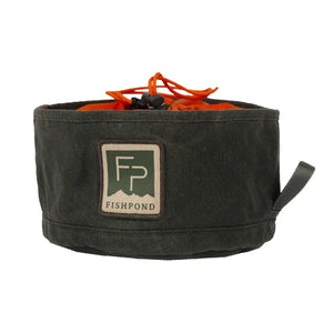 Duskwood Fishpond Bow Wow Travel Food Bowl with orange drawstring cover closed on a white background.