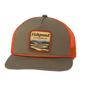 Fishpond Last Light Trucker Hat in orange and tan, with sunset patch on front, on a white background