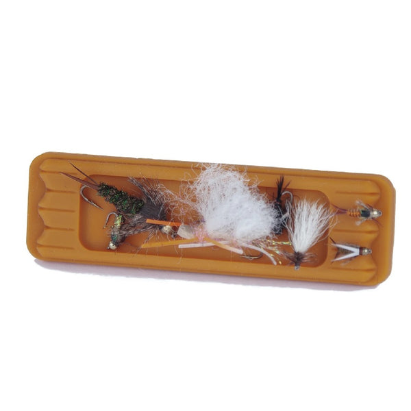 Burnt orange Fishpond Tacky Mag Pad with flies for example on a white background.
