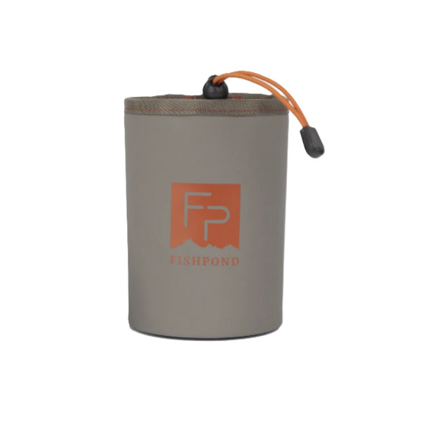 A slate colored Fishpond Thunderhead Water Bottle Holder with a drawstring cinch cord, orange interior, and logo on front, against a white background.