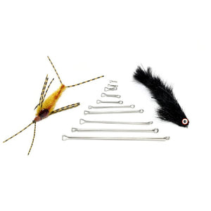Fishing flies tied with Fish Skull Next Gen Shanks and an assortment of shanks on a white background