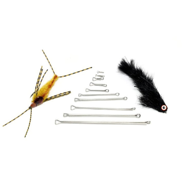 Fishing flies tied with Fish Skull Next Gen Shanks and an assortment of shanks on a white background