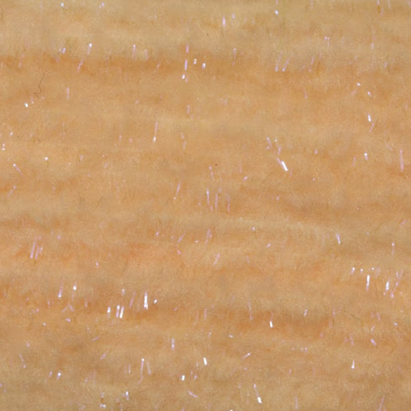 UV Fluorescent Flesh color Fulling Mill EZ Egg Yarn fly tying material, close up.