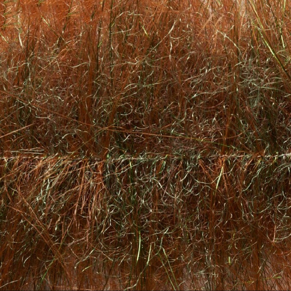 Brown olive color Fulling Mill Flashy Craft Brush fly tying material, close up.