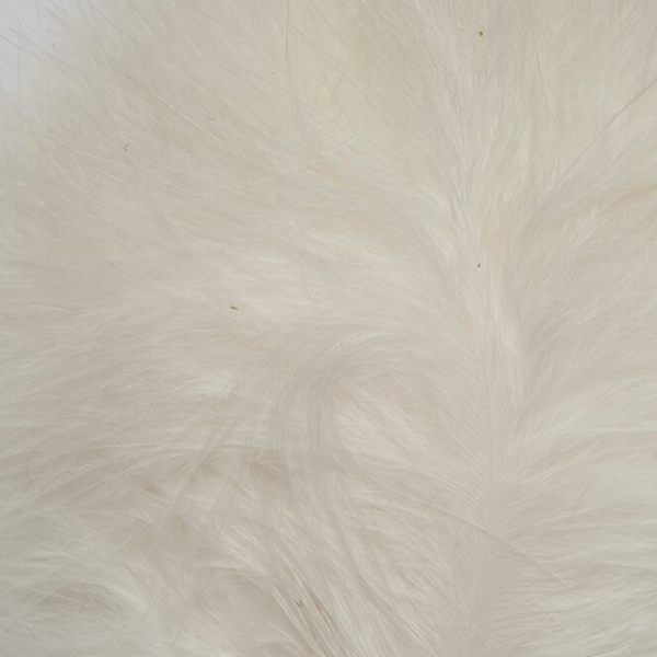 White color Fulling Mill Mini Marabou feathers for fly tying, shown close up.