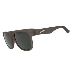 Goodr BFG Sunglasses with a brown wood grain frame and dark lenses on a white background.