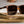 Goodr LFG Smaller is Baller Sunglasses on a stack of money.