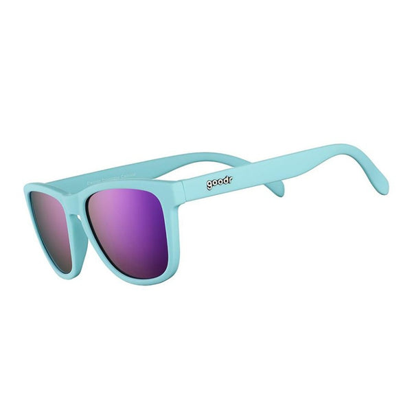 Light blue Goodr OG sunglasses with purple lenses on a white background.