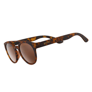 Goodr PHG Sunglasses with tortoiseshell frame and brown lenses on a white background.