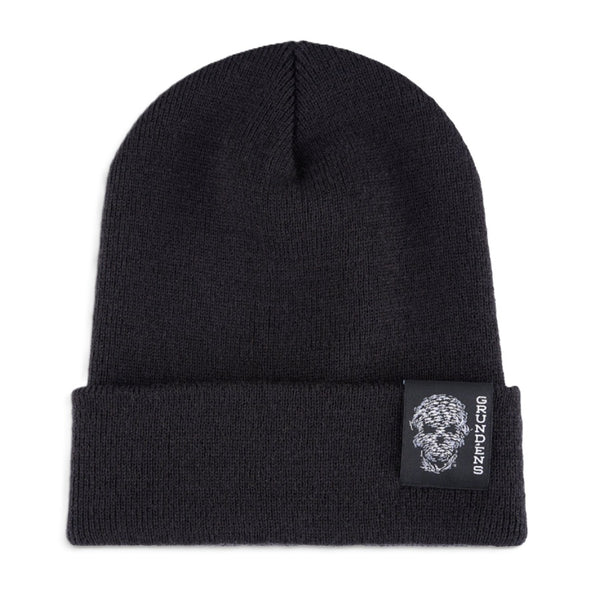 Front of the Grundens Bait Ball Beanie, with graphic patch on the rolled cuff, against a white background. 