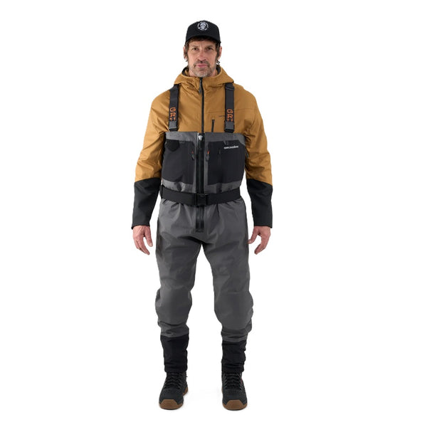 Person wearing a brown jacket under the Grundéns Men's Vector Zip-Front Stockingfoot Waders, against a white background.