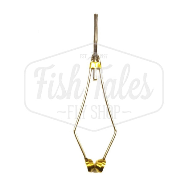 A metal fly tying bobbin against a white background, with the logo 'Fish Tales Fly Shop' displayed.