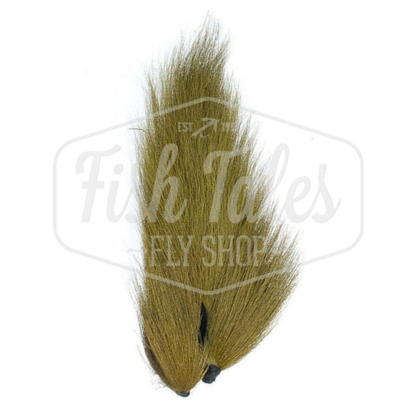 An olive dyed Hook and Hackle Whole Bucktail for fly tying shown from the underside, on a white background with the Fish Tales logo watermark.