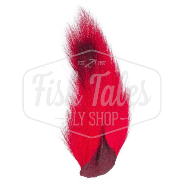 A red dyed Hook and Hackle Whole Bucktail for fly tying shown from the underside, on a white background with the Fish Tales logo watermark.