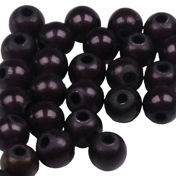 group of black beads for fly tying