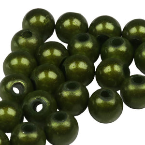 group of olive green beads for fly tying