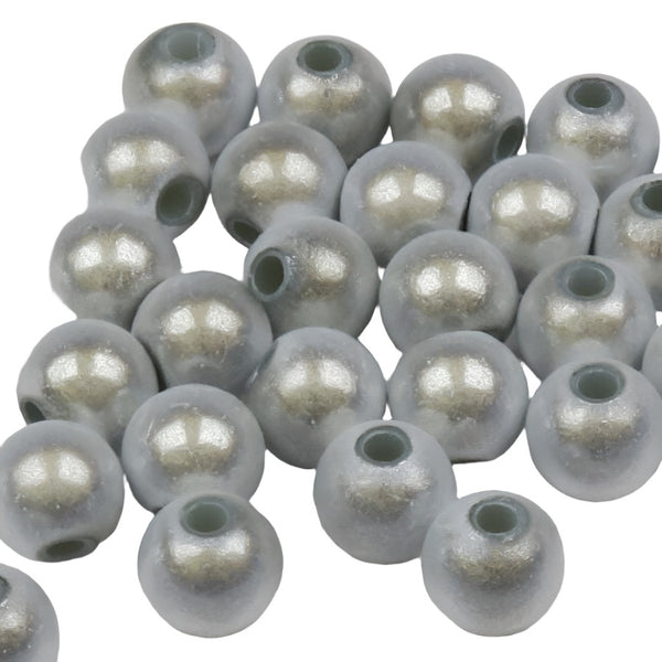 group of white beads for fly tying