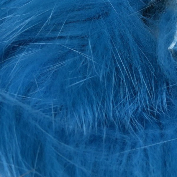 closeup of dyed kingfisher blue arctic fox fur used for fly tying