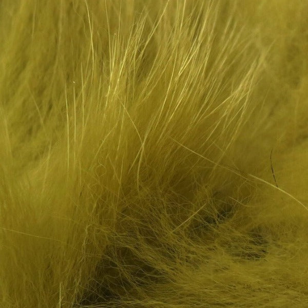 closeup of dyed olive arctic fox fur used for fly tying