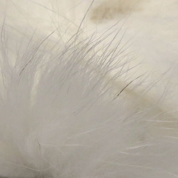 closeup of natural white arctic fox fur used for fly tying