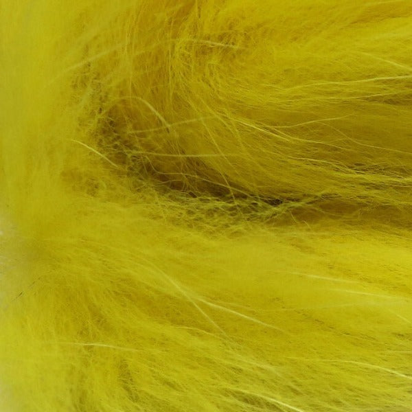 closeup of dyed yellow arctic fox fur used for fly tying