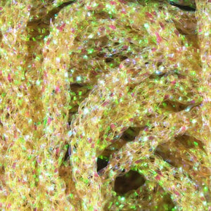 Close up of bonefish tan Hareline Dyed Pearl Diamond Braid. 