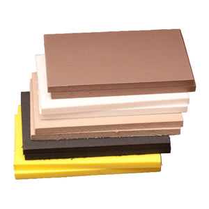 Stack of various colored Hareline 6mm fly tying foam sheets on a white background.