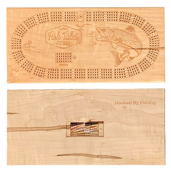 Front and back side of a 4-track wooden cribbage board made with maple with engraved fly fishing design, on a white background.